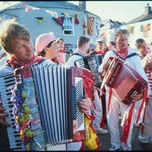 Old Oss accordion players in evening sun