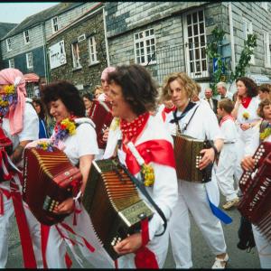 Women from Old Oss playing accordions with kids Oss