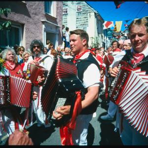 Men playing accordions in Old Oss parade