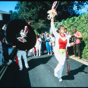 Woman teasing Old Oss on road