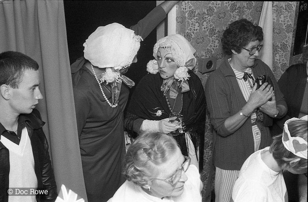 Merrymakers in pub dressed up