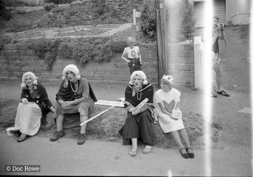Merrymakers outside in costume