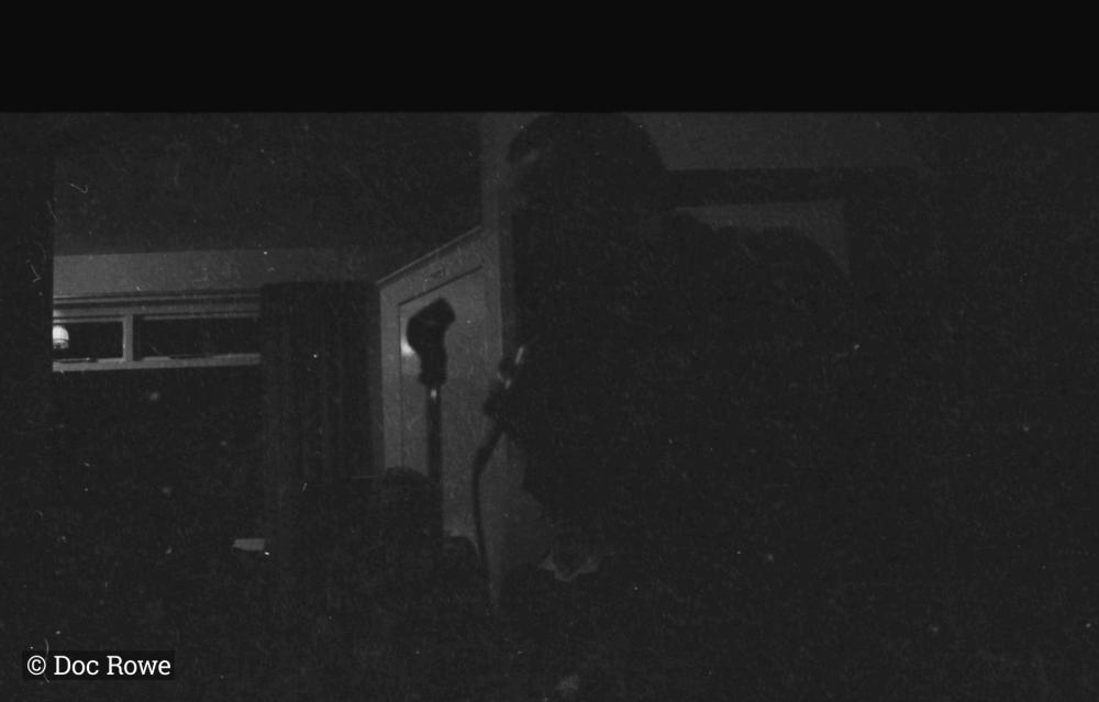 man singing into microphone