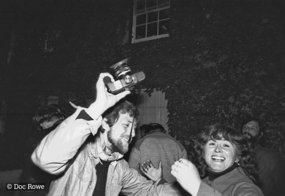 man with camera outside