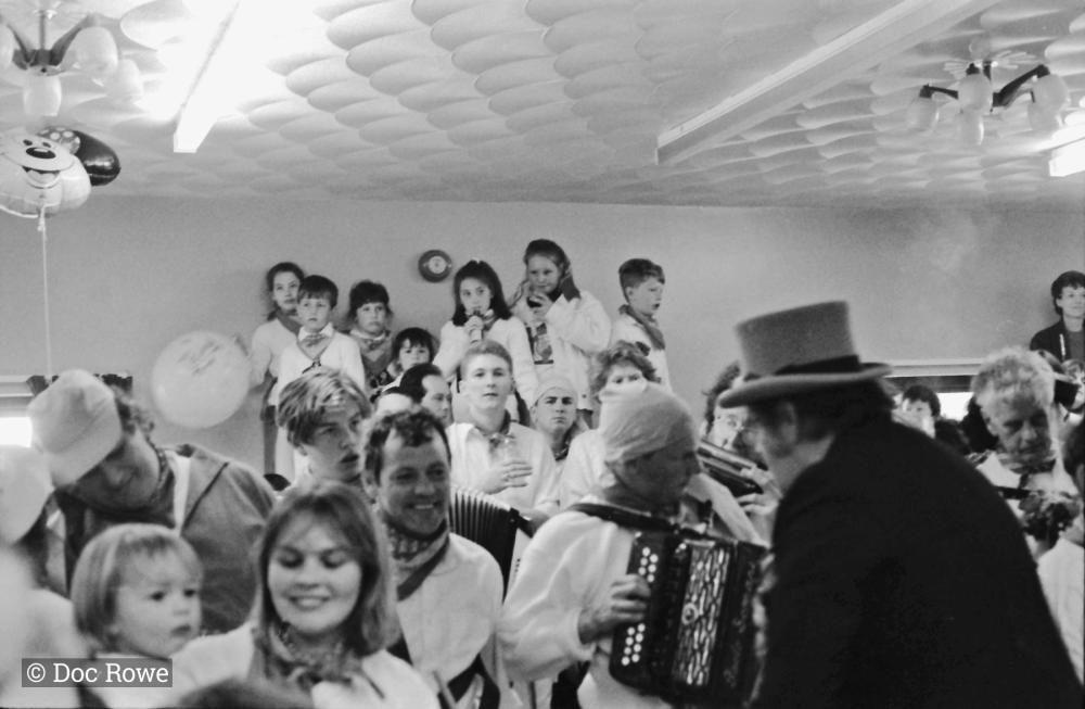 master of ceremonies w accordion players indoors