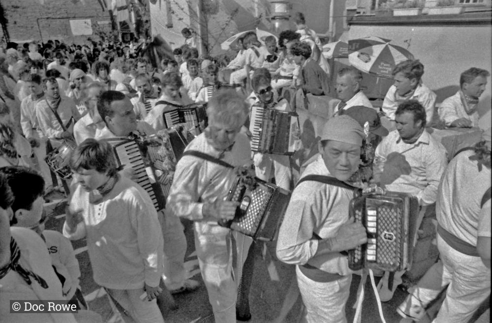 accordion players in procession