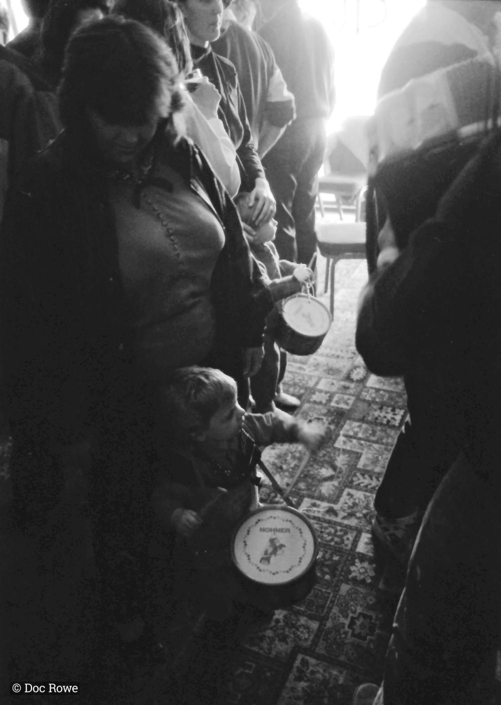 children playing drums in pub