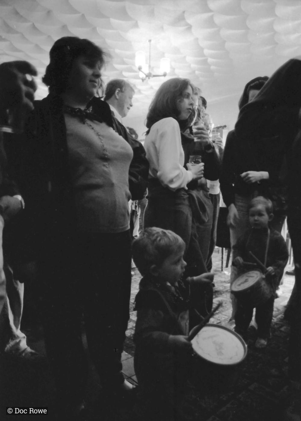 children playing drums in pub
