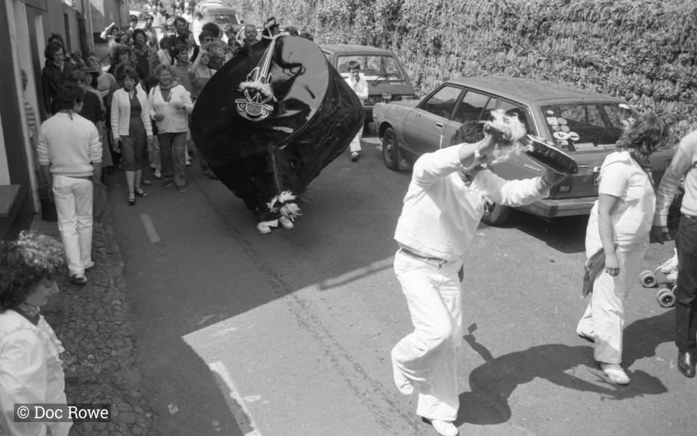 old oss being teased in procession