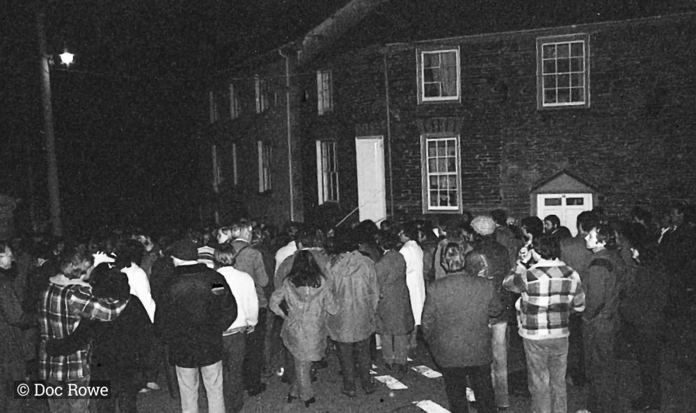 people in street on may eve