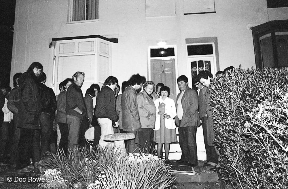 people outside house on may eve
