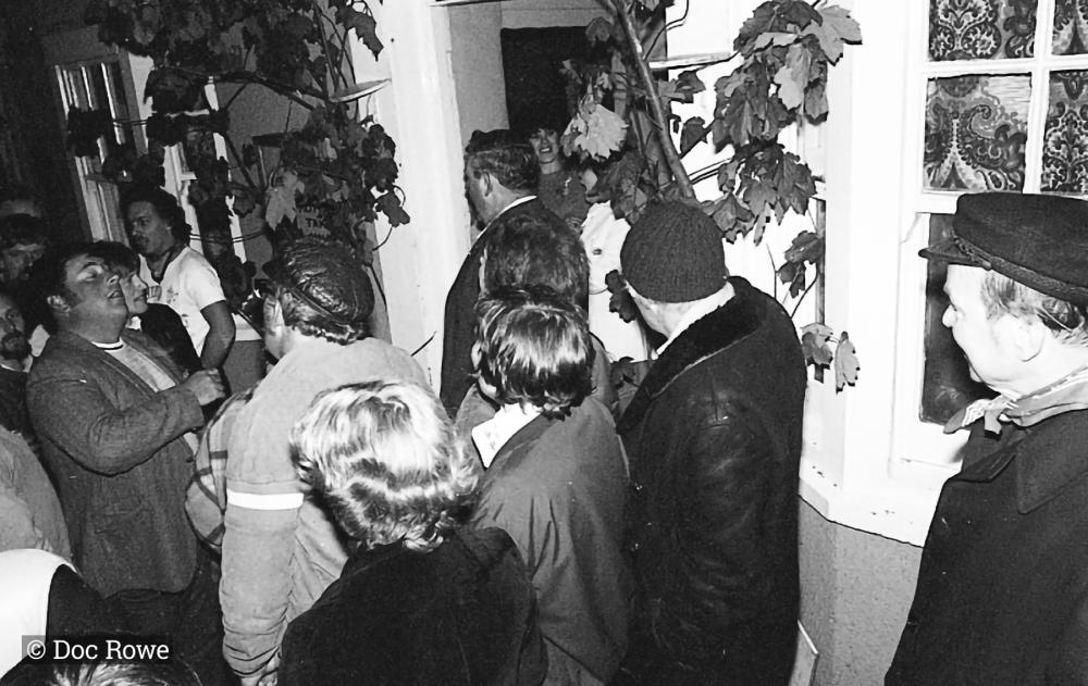 people outside pub on may eve