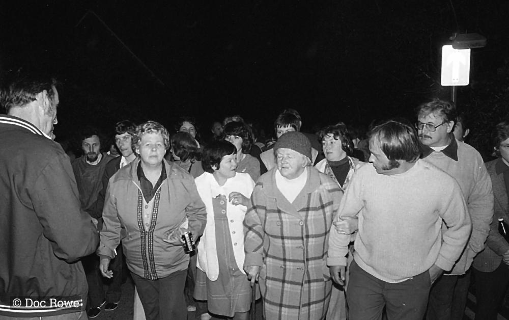 people walking at night