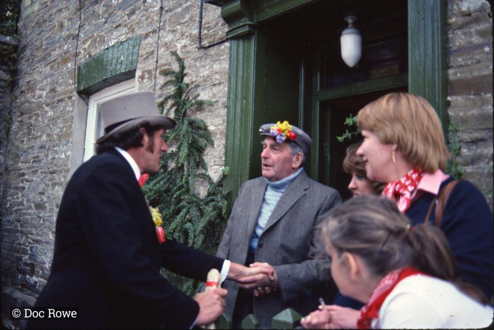 Master of Ceremonies shaking hands with a man