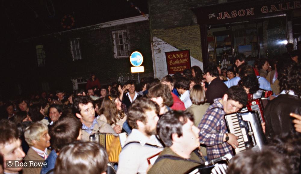 Crowds in the street at night