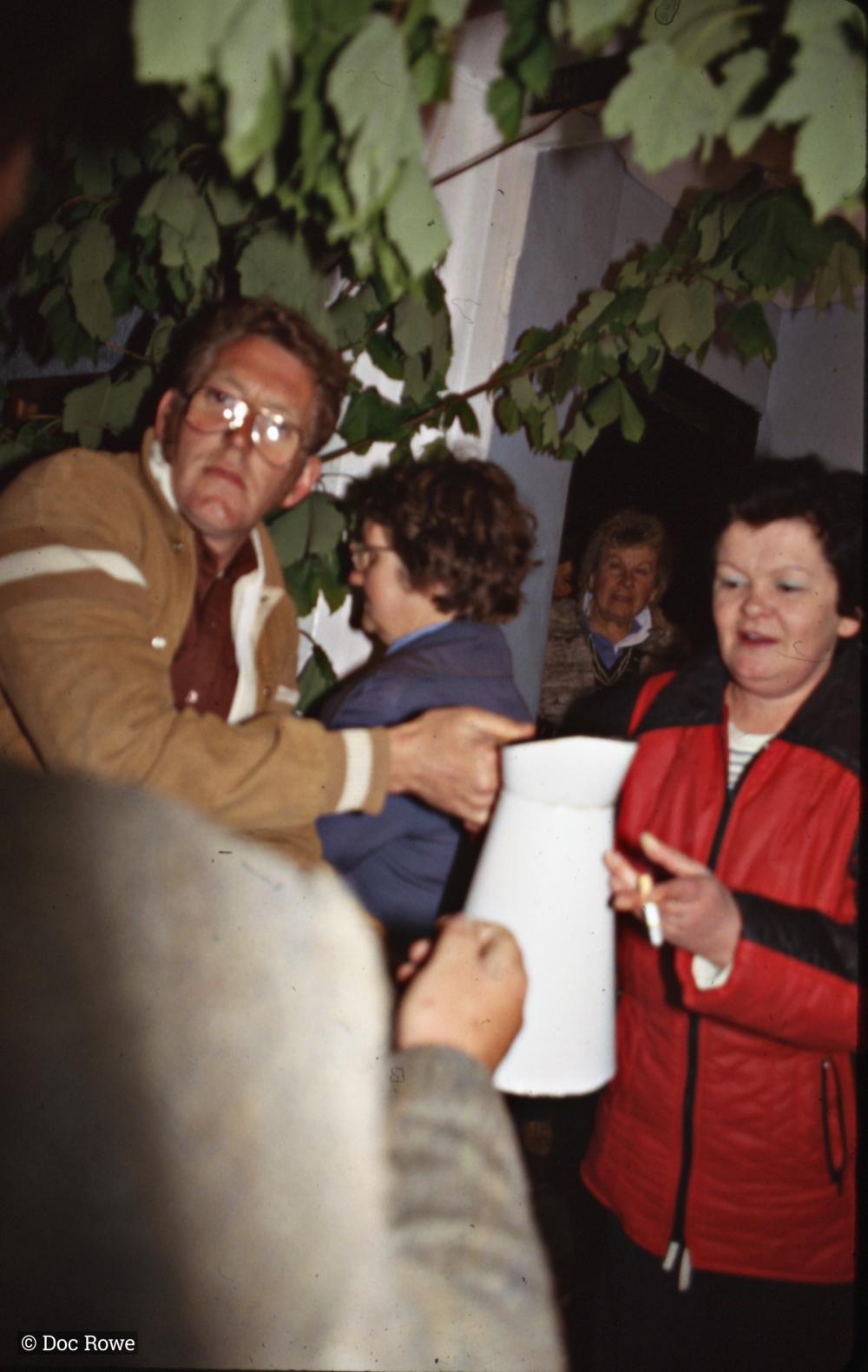 People stood outside the pub