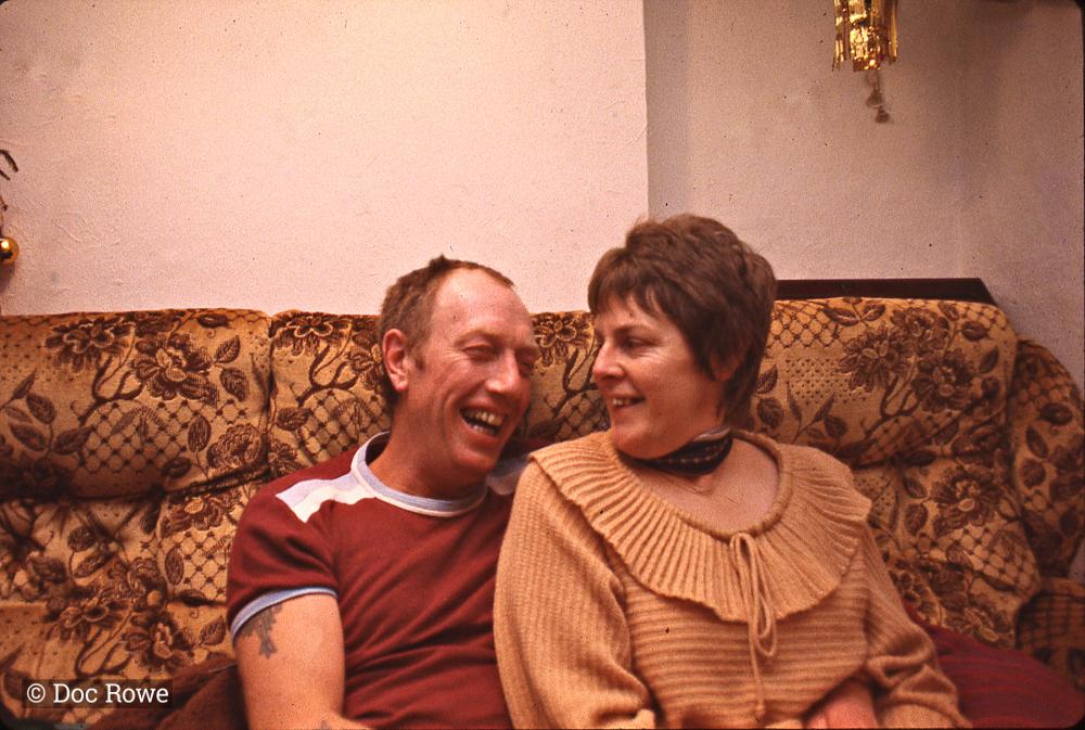 Couple sat on sofa