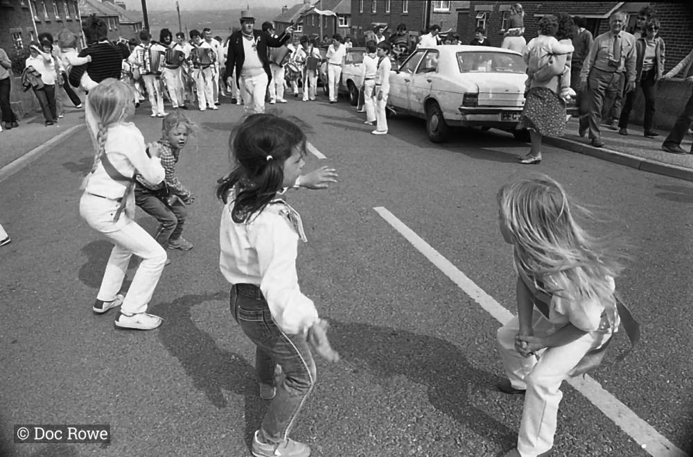 kids dancing in road