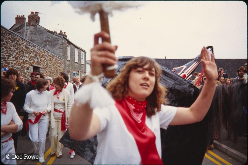 Woman with club, Old Oss behind