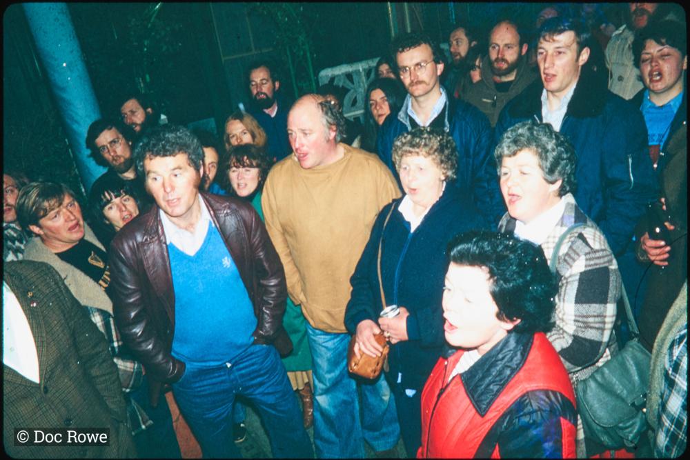 Night time, people singing