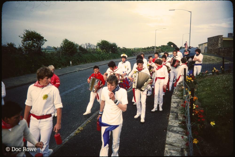 Early morning, Children's Oss band  walking along road