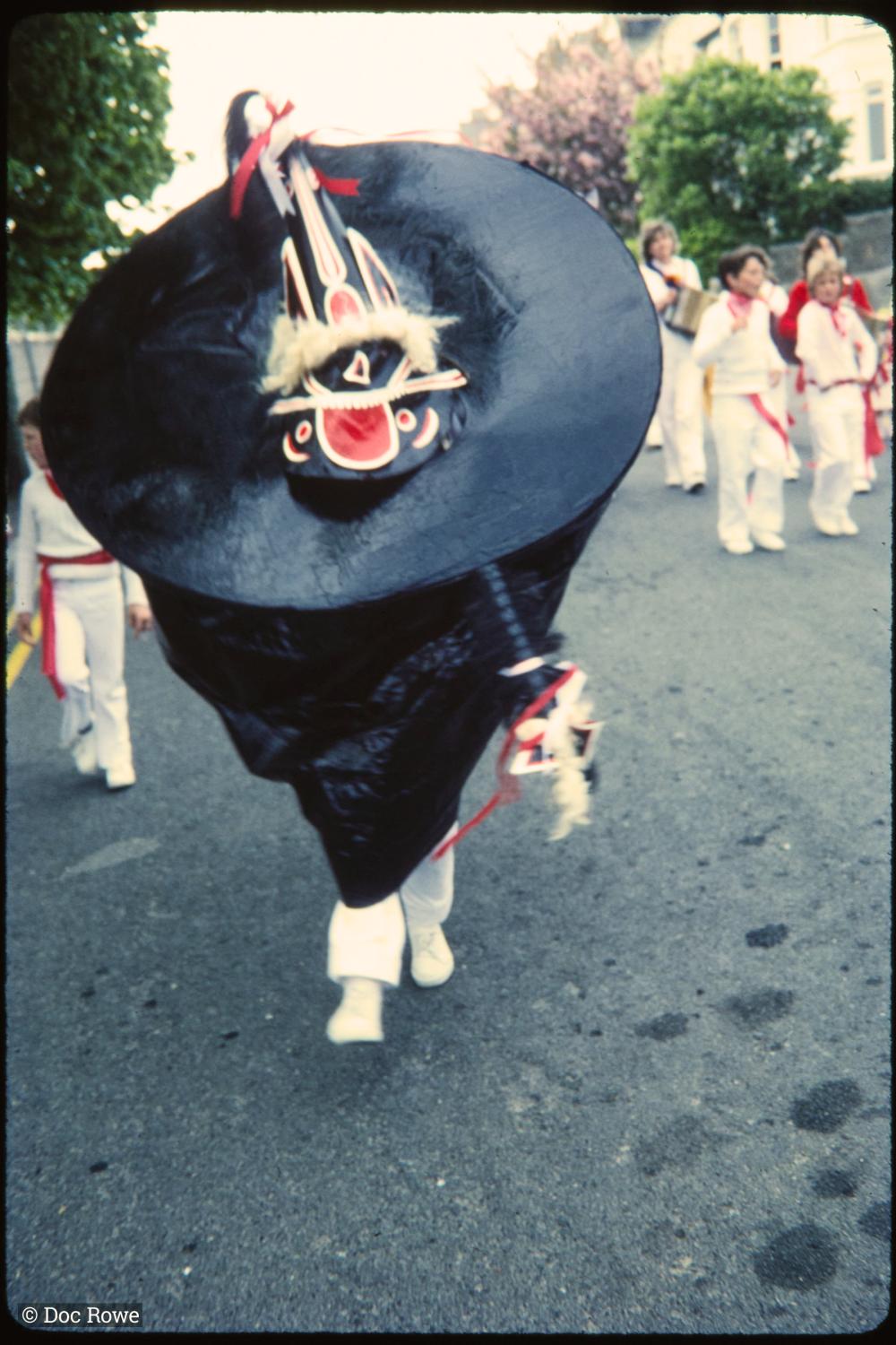 Old Oss walking on road
