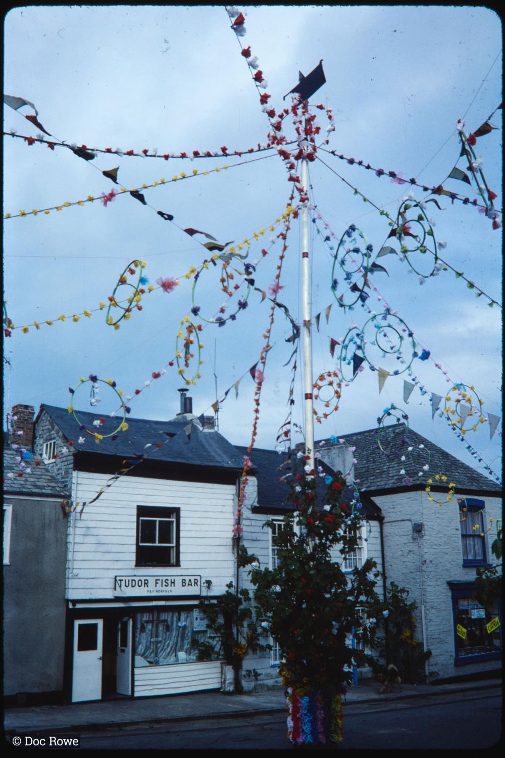 Maypole under cloudy sky