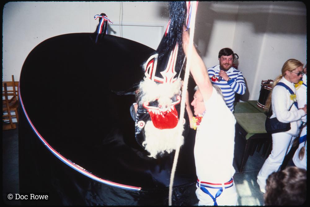 Blue Ribbon hat being placed on rider's head