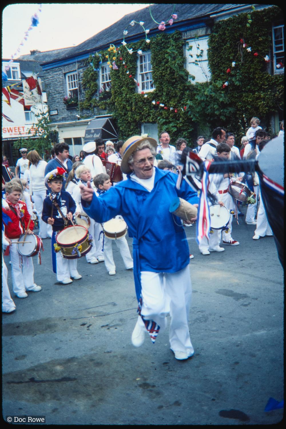 Woman dancing in procession
