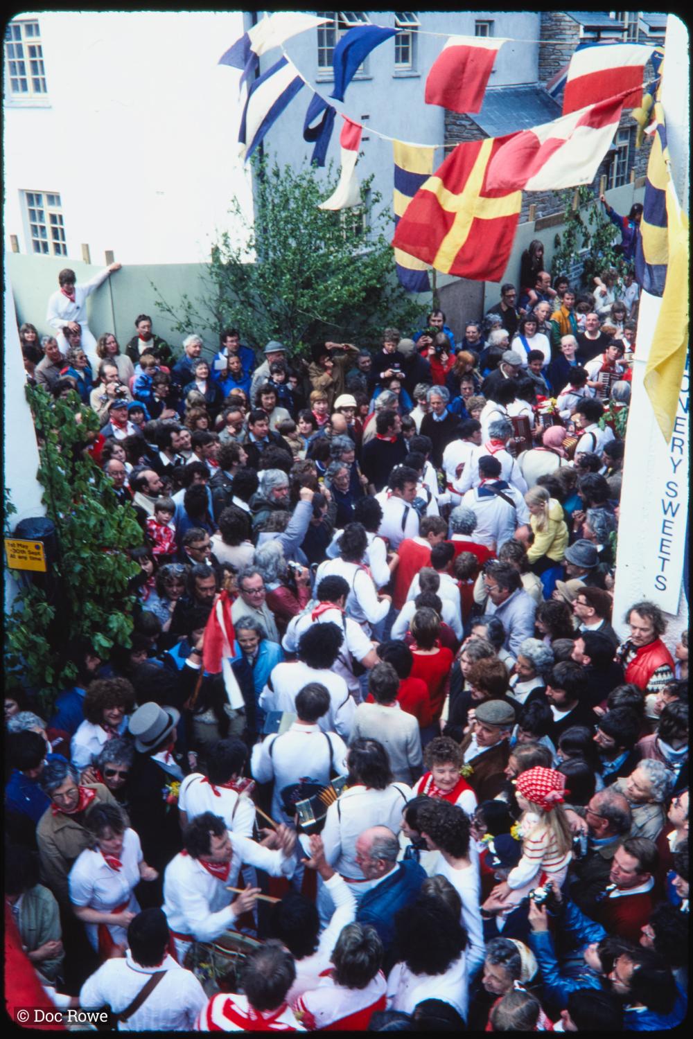 Old Oss procession walking up Lanadwell street