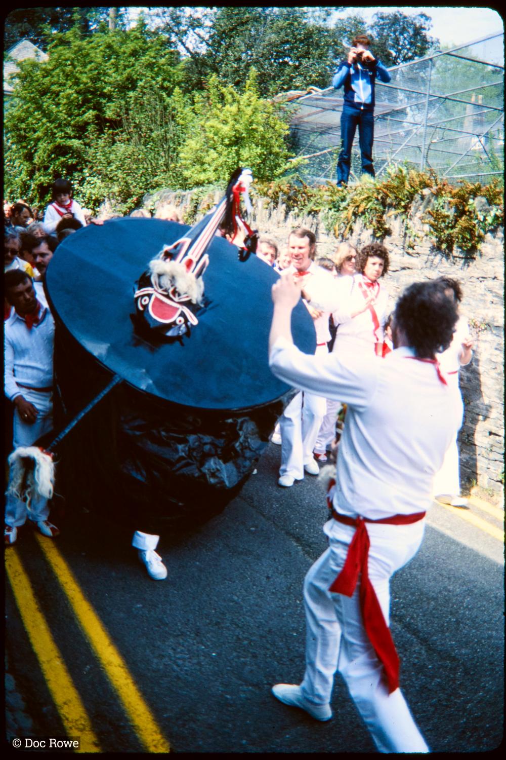 Old Oss being teased in procession