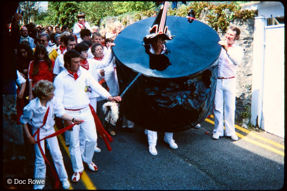 Old Oss being teased in procession