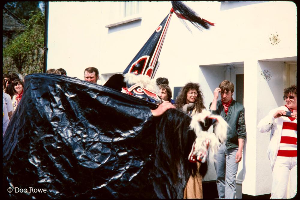 Old Oss being teased in procession