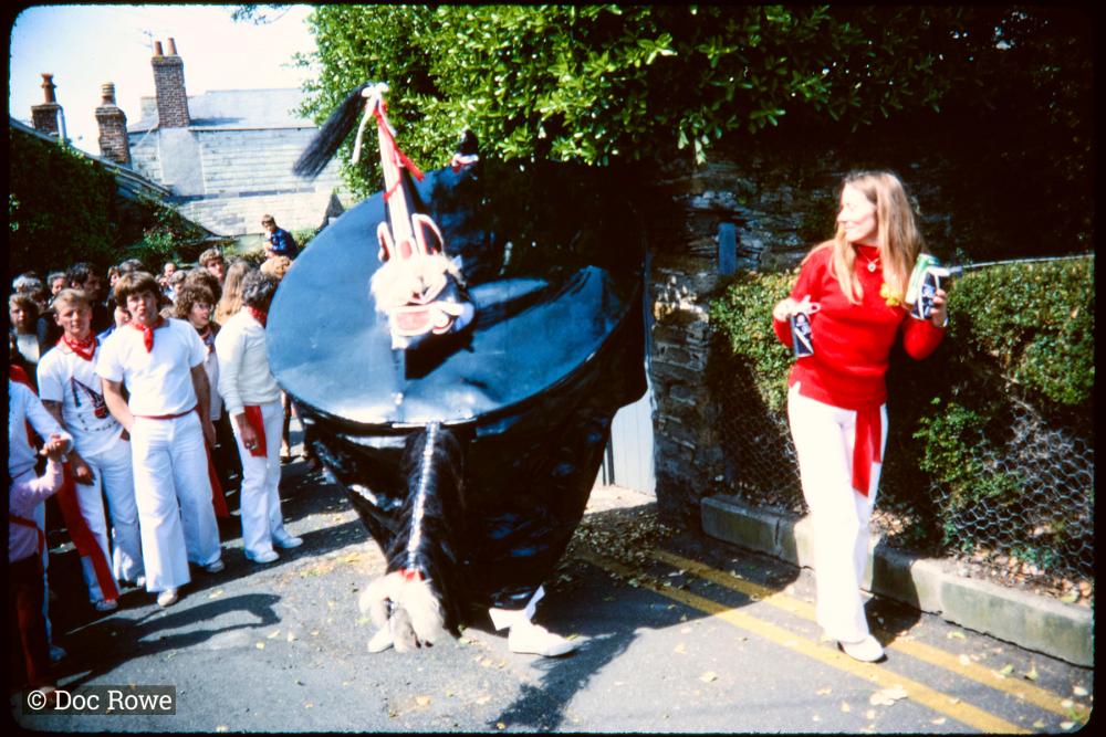 Old Oss being teased in procession
