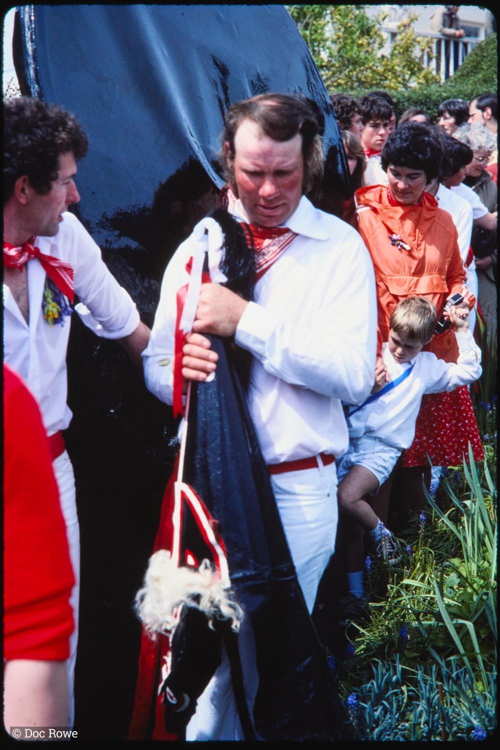 Man holding Old Oss hat
