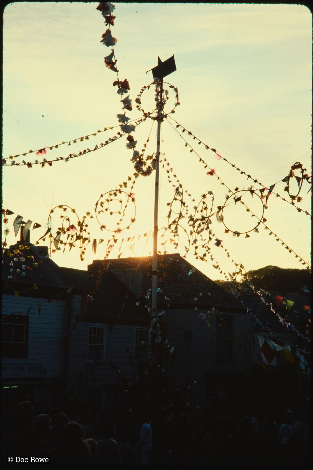 Maypole with light shining through 