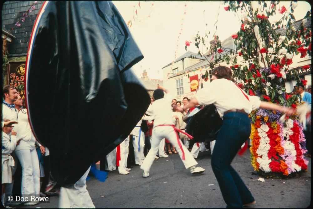Blue Ribbon Oss being teased under maypole