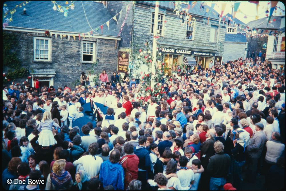 Crowds gathered under the maypole with the osses