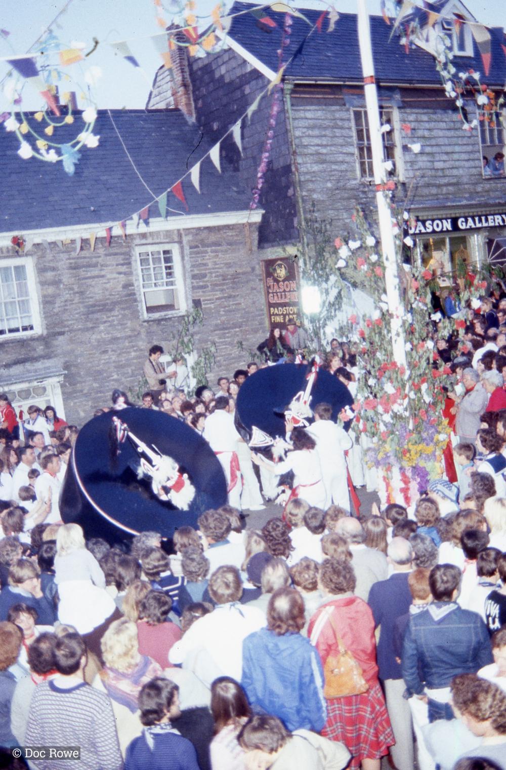 Crowds gathered under the maypole with the osses