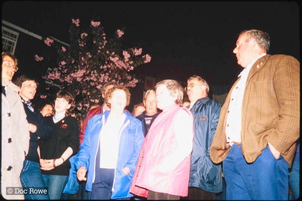 People singing at night