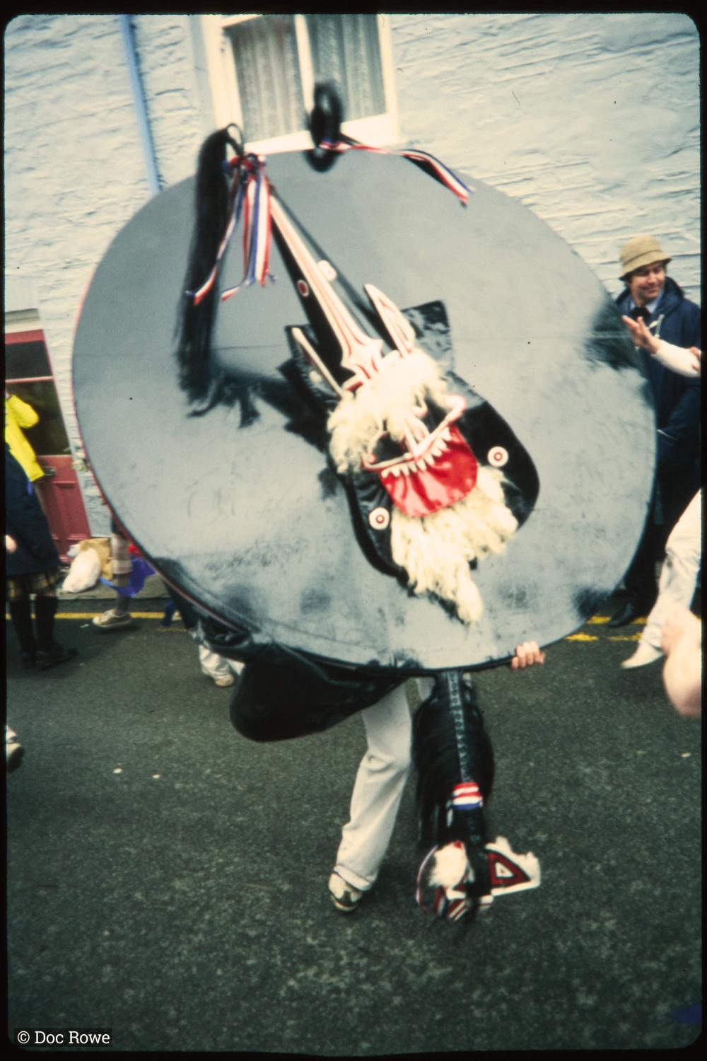 Blue Ribbon Oss dancing in road