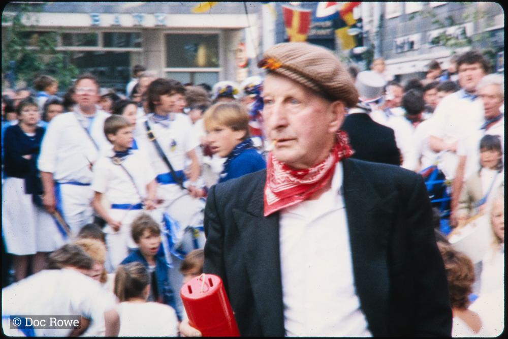 Man holding charity collection pot