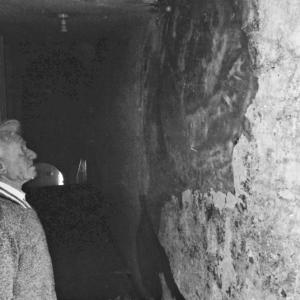 man in alleyway