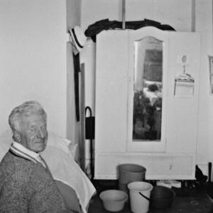 man sat at table