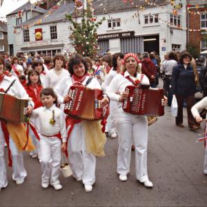 Old Oss musicians under maypole