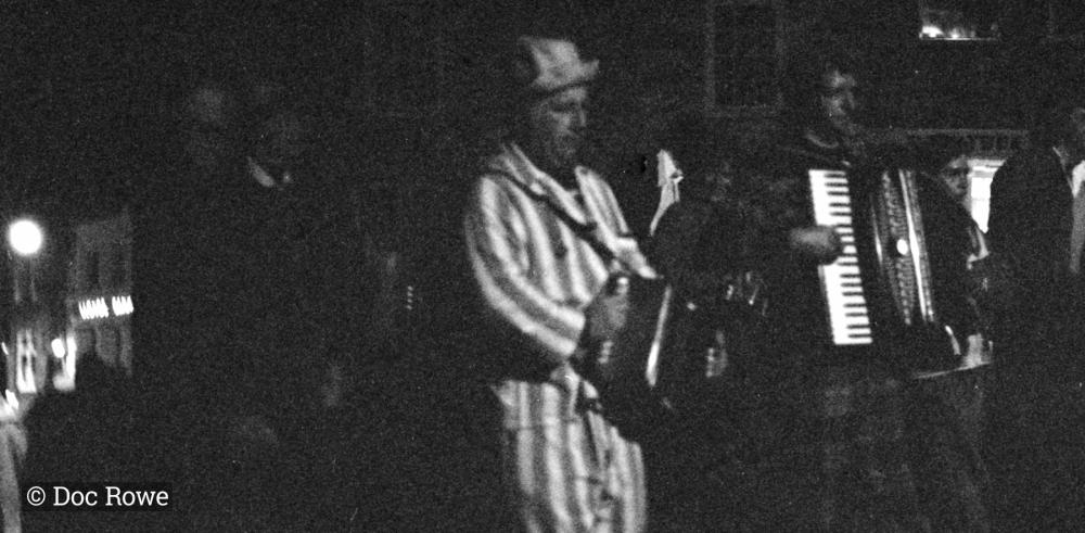 merrymakers in street