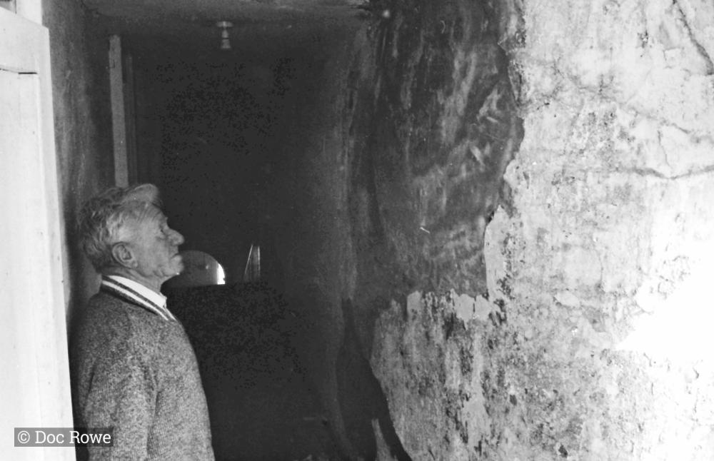 man in alleyway