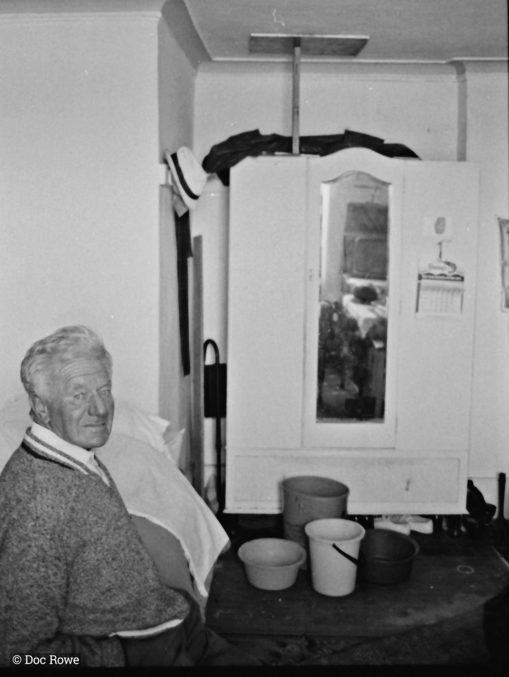 man sat at table