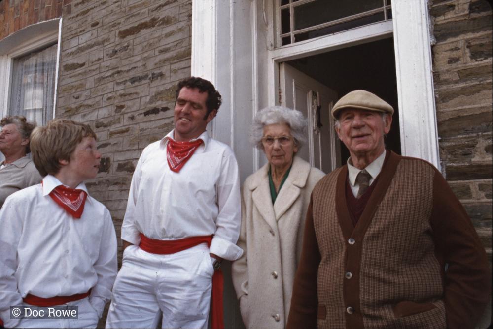 People stood in house doorway