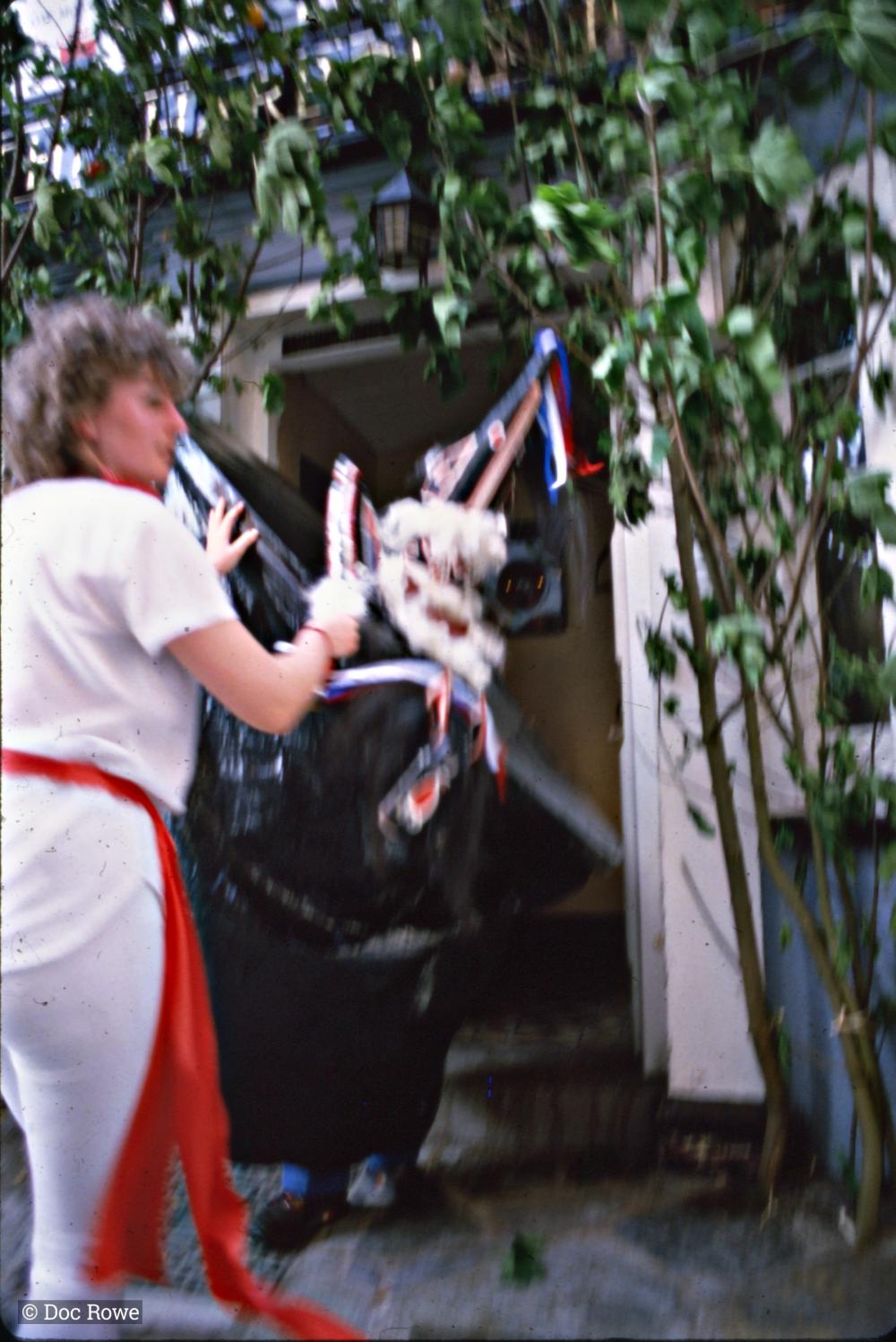 Blue Ribbon Oss coming out of doorway